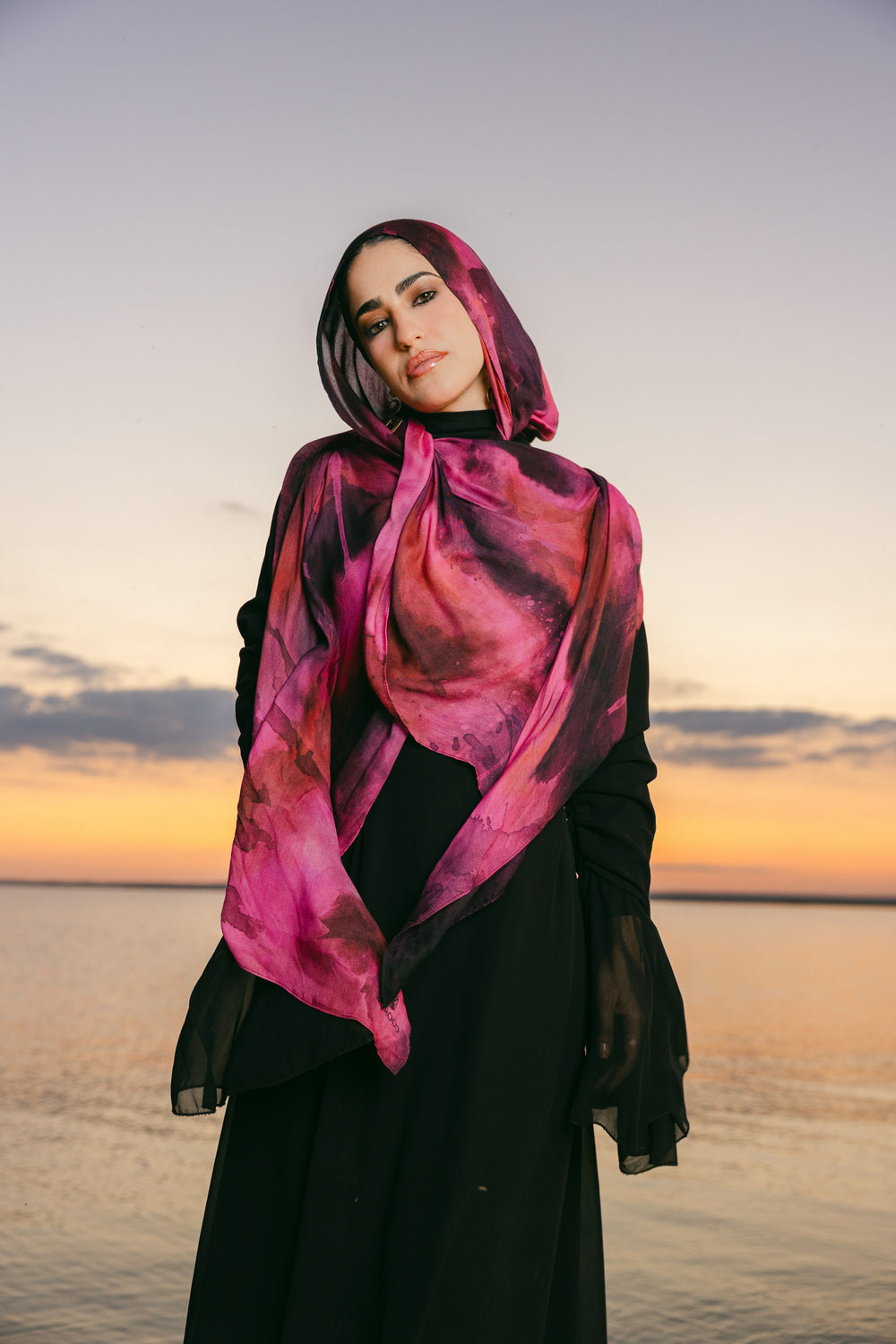 Jumrah modal scarf worn as a lightweight hijab with warm fluid drape – وشاح جمرة مودال يُرتدى كحجاب خفيف بانسيابية دافئة
