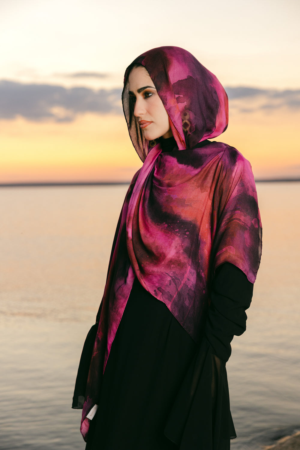 Jumrah modal scarf worn as a lightweight hijab with warm fluid drape – وشاح جمرة مودال يُرتدى كحجاب خفيف بانسيابية دافئة