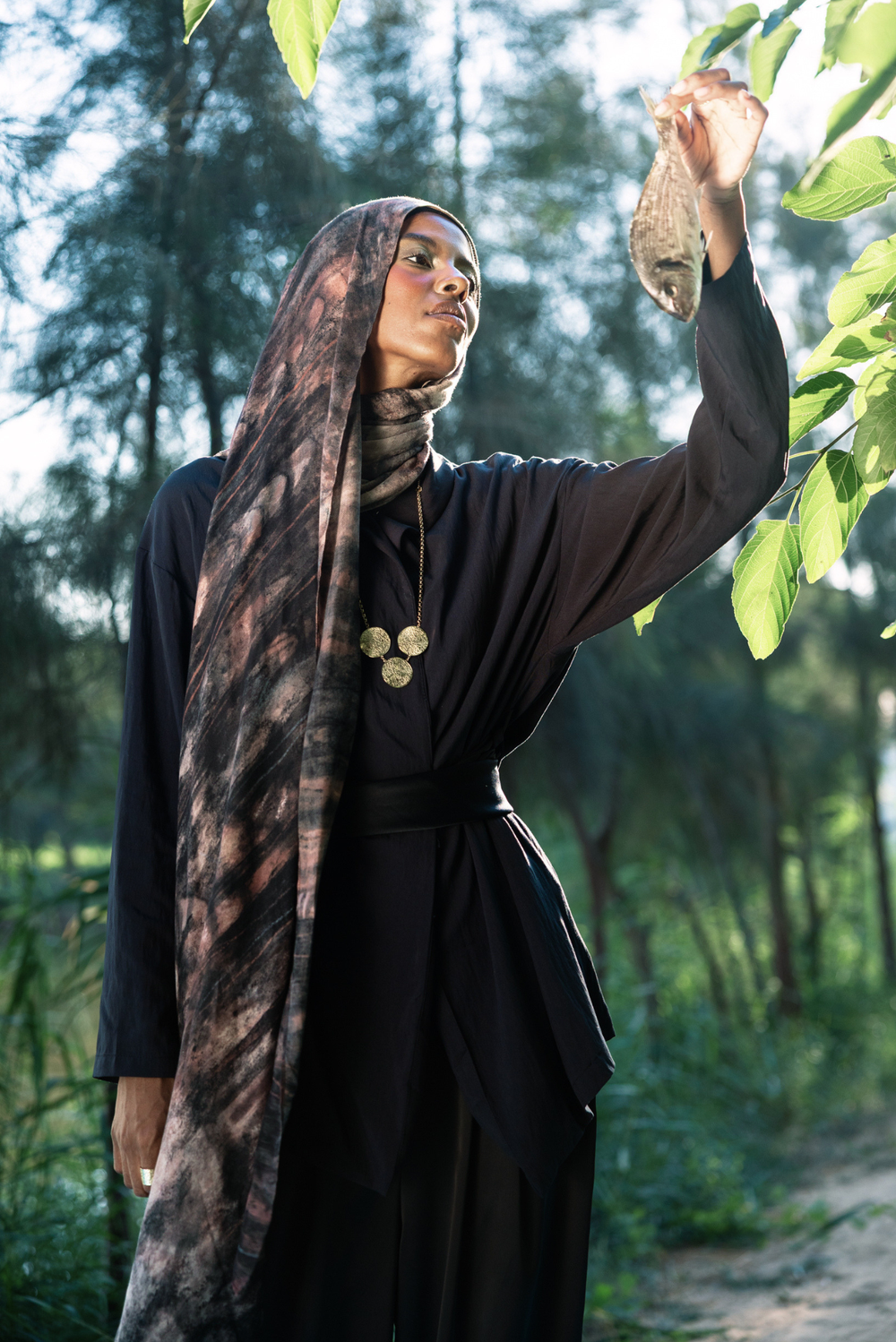 Nilea printed premium modal scarf with Nile-inspired aquatic forms, layered textures, and lightweight breathable drape by WOROOD