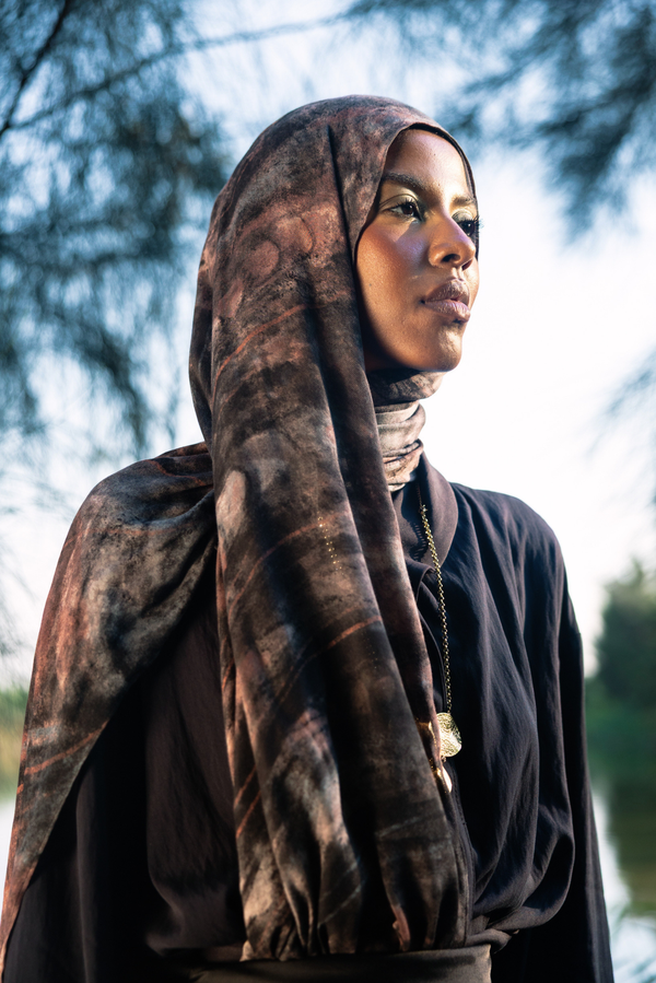 Nilea printed premium modal scarf with Nile-inspired aquatic forms, layered textures, and lightweight breathable drape by WOROOD