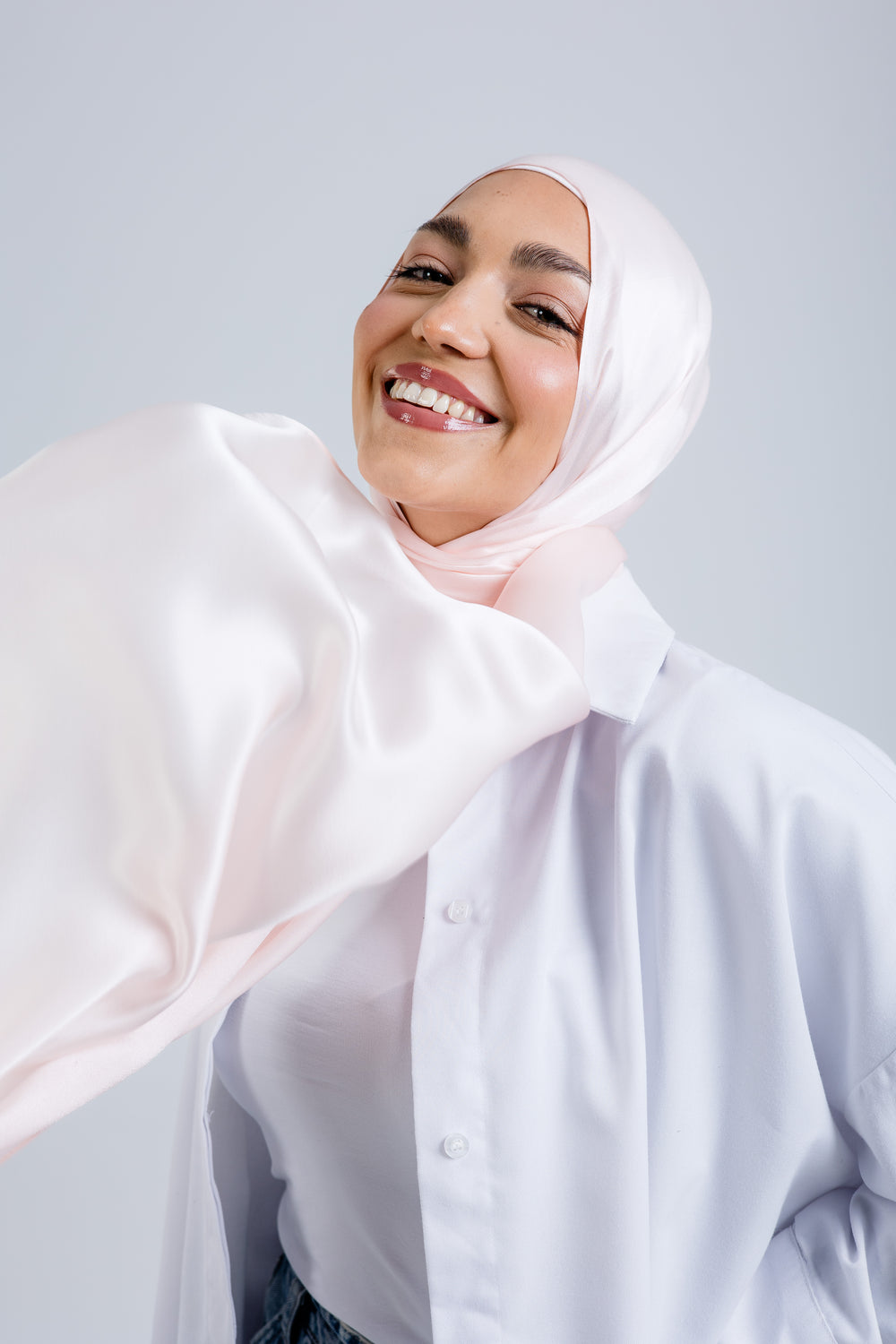 Worood Powder Silk Scarf Rectangle – pastel powder pink silk scarf with smooth matte sheen - وشاح حريري مستطيل Powder من Worood - وشاح حريري بلون وردي فاتح باستيل مع لمعة ناعمة غير لامعة