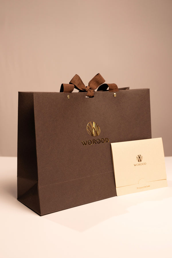 WOROOD premium gift package with signature brown gift bag, ribbon, gold embossed logo and personalized gift card