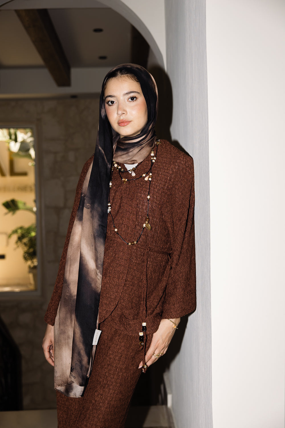 Sira printed a premium modal scarf styled as a breathable, lightweight hijab by WOROOD