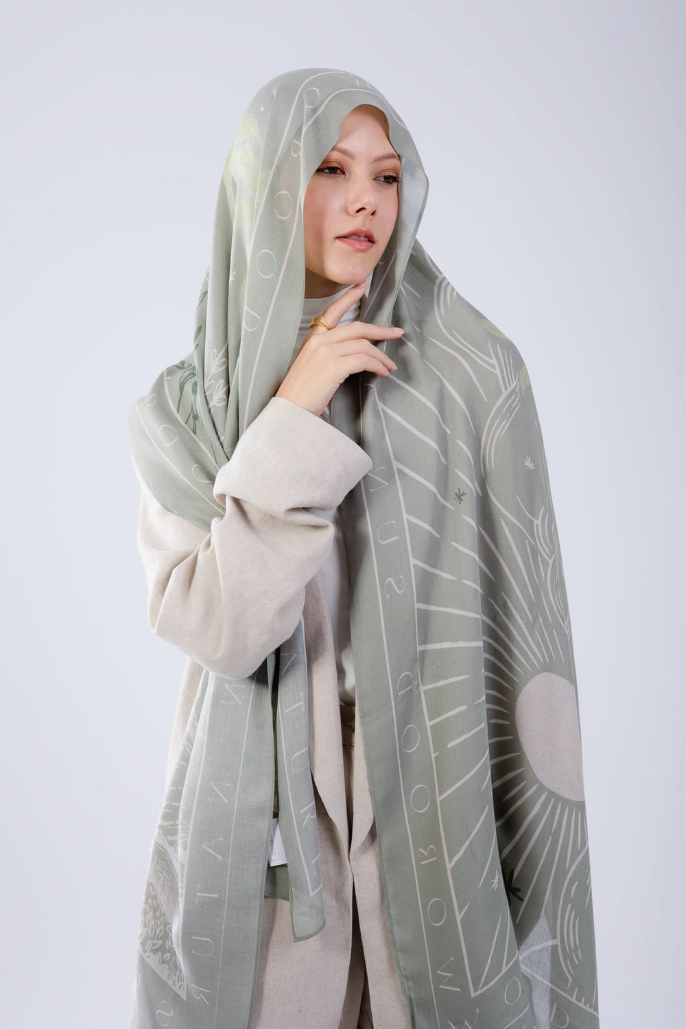 Worood Sunny Days sage modal scarf styled for modern, understated elegance.