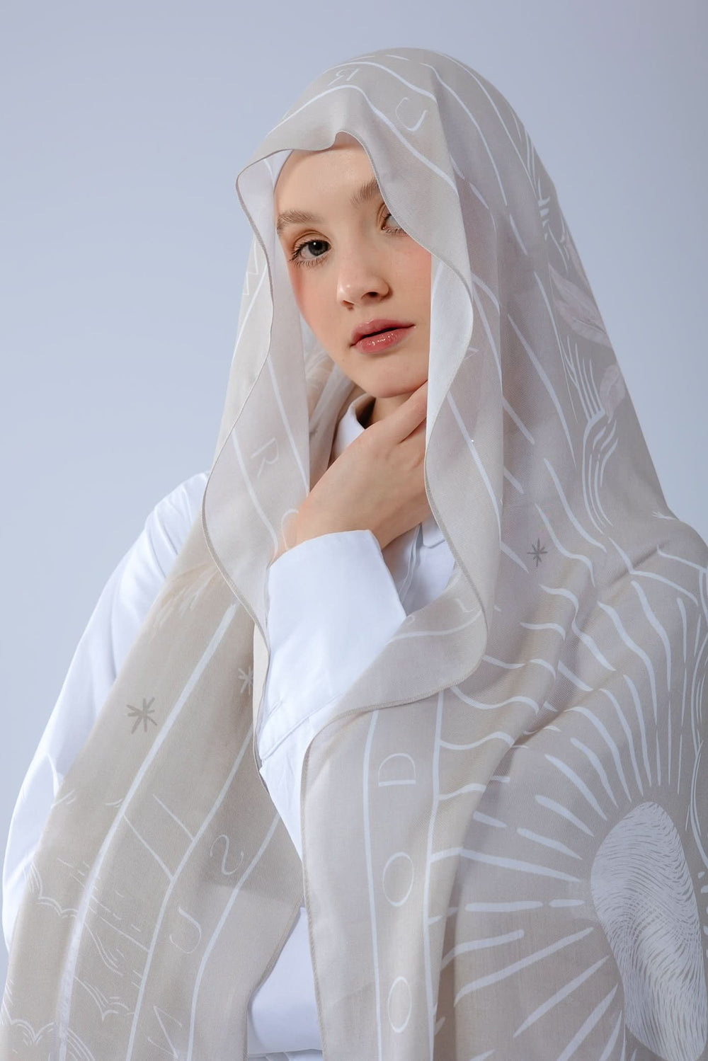 Beige modal scarf from Worood House featuring smooth texture and elegant drape.