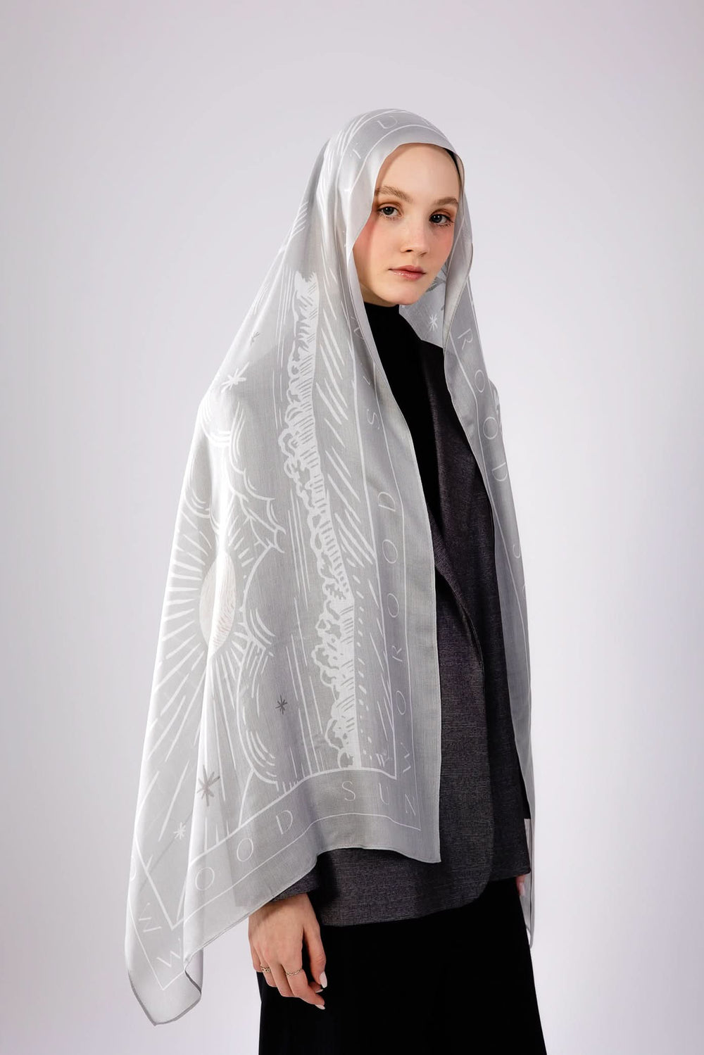 Worood Sunny Days grey modal scarf styled to highlight fluid movement and premium finish.